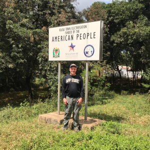 Lane Bailey ’87 ’89 stands just outside Kilosa Township, which is located in the Kilosa District in the Morogoro Region of Tanzania. Bailey, who is city manager of Salisbury, traveled to Tanzania as part of the International City/County Management Association’s ENGINE Program. Photo submitted